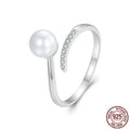 Adjustable S925 sterling silver ring with shell pearls in open loop design