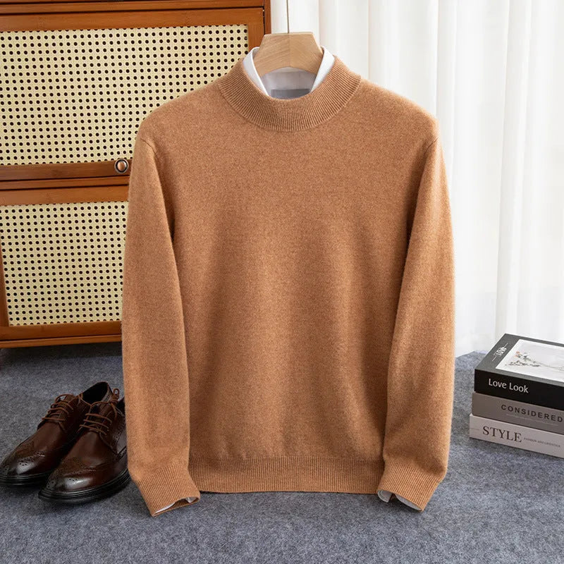Men's half-turtleneck loose fit wool sweater in a neutral colour on a hanger.