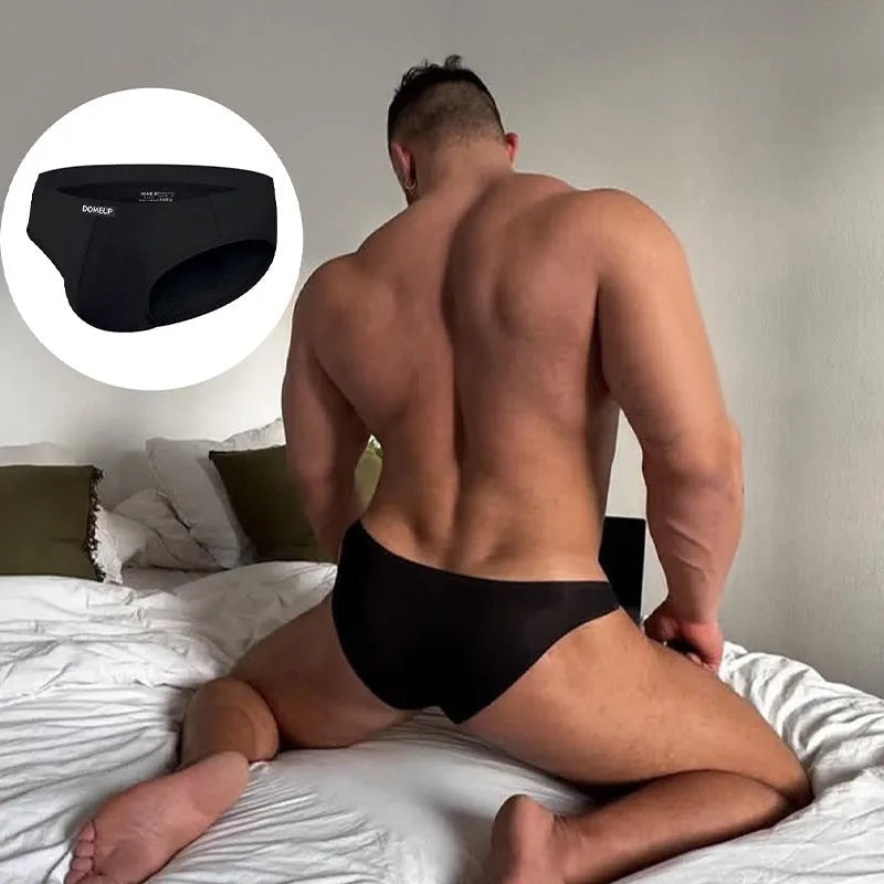 Men's solid colour low waist breathable briefs in white, shown on a size chart.