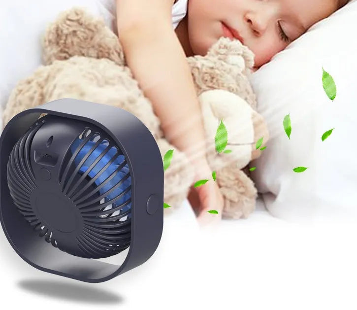 USB charging desk fan with alarm clock in blue colour on a desk