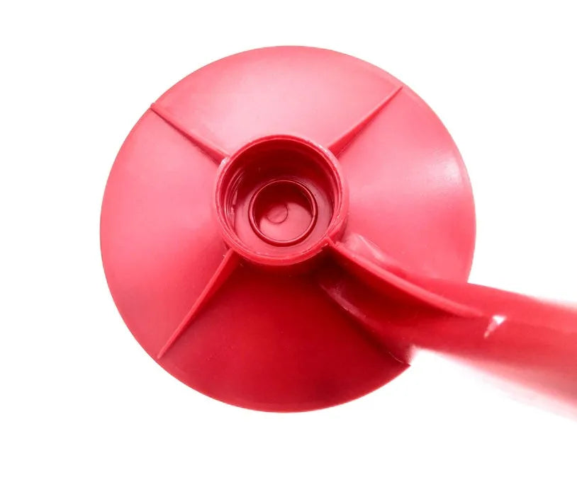 Red plastic Magic Tap soda bottle dispenser attached to an inverted 2-litre bottle.