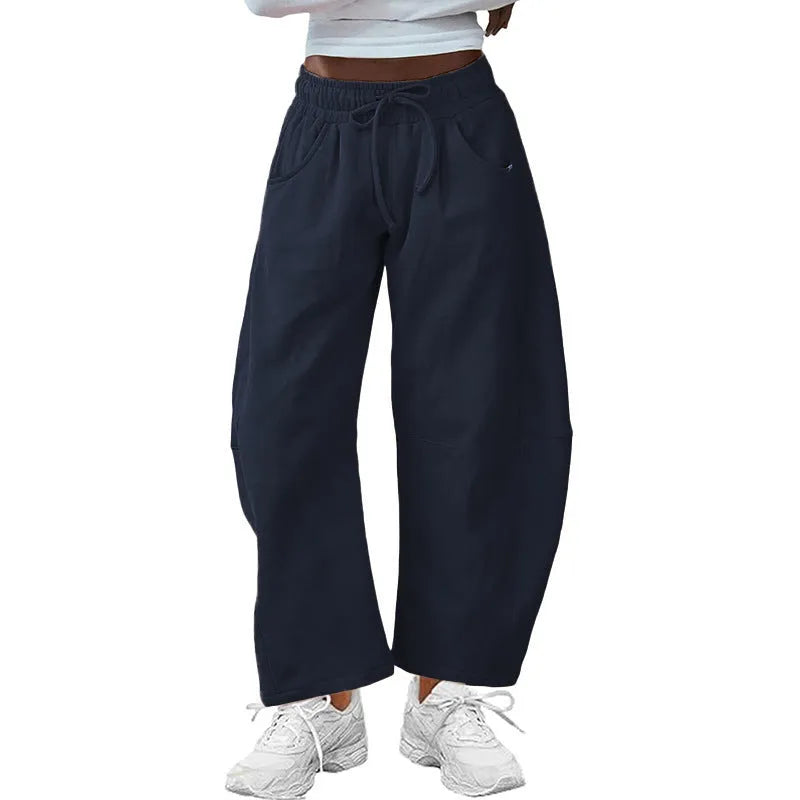 Women's loose fit cropped sweatpants with drawstring waist and side pockets in cotton blend fabric