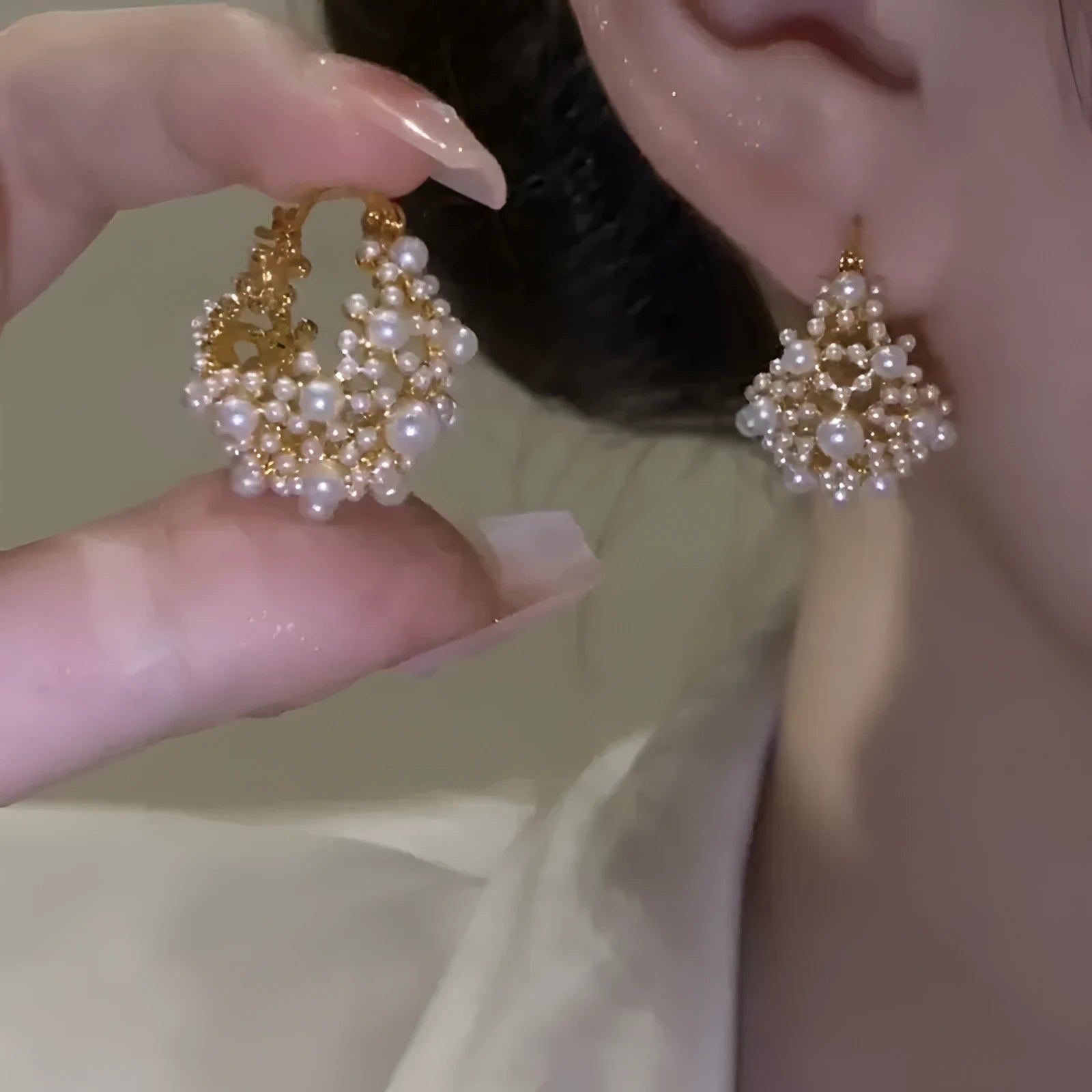 Gold-coloured copper basket flower earrings with pearl inlay and small rice-shaped bead detailing