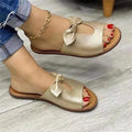 Ladies casual bow sandals in black, pink, or gold colours with fish mouth style and rubber soles.