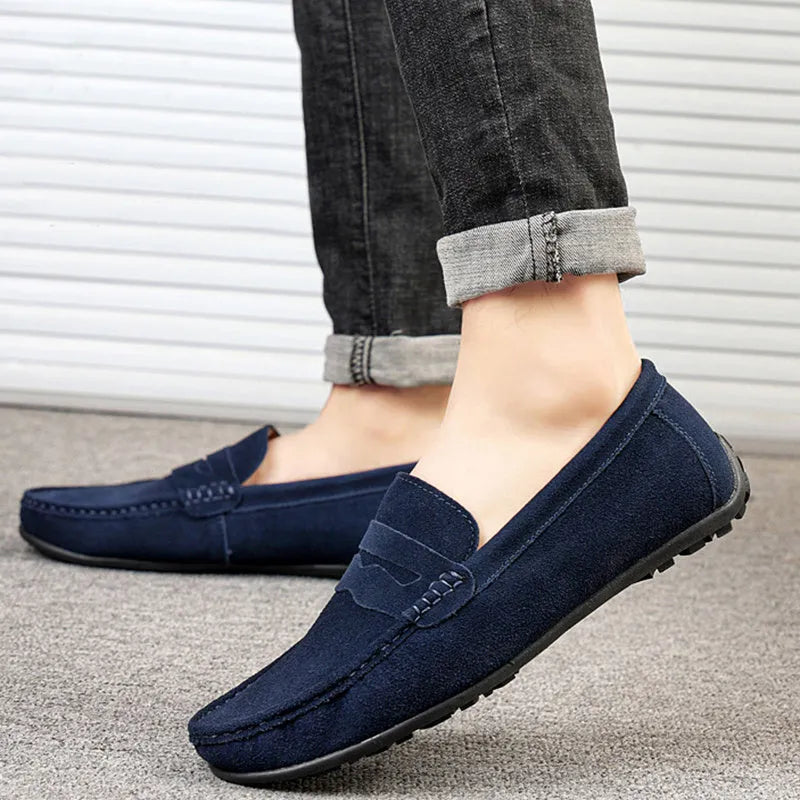 Men's solid colour suede loafers with a round toe and flat rubber sole