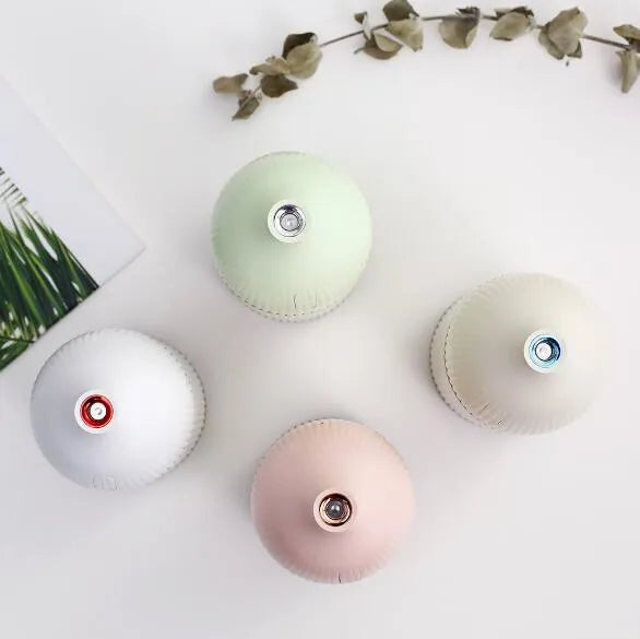 White ultrasonic aromatherapy diffuser with LED light and 300ml water capacity, measuring 80x80x155mm