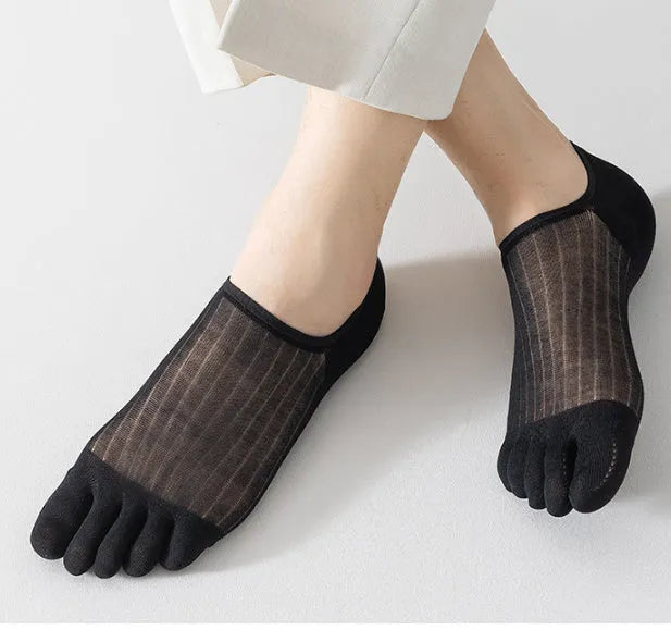 Ultra-thin modal cotton five-finger boat socks in black, shown on a foot.