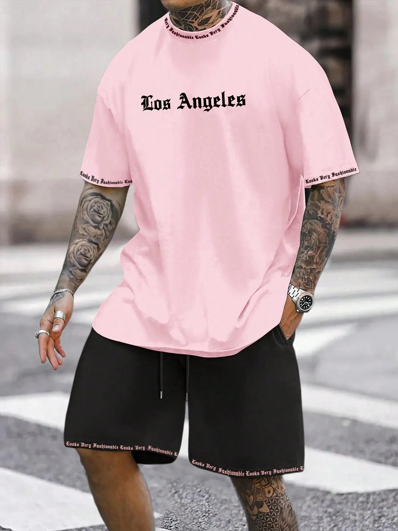 Sports style short-sleeved top and matching shorts set in solid colour on hanger
