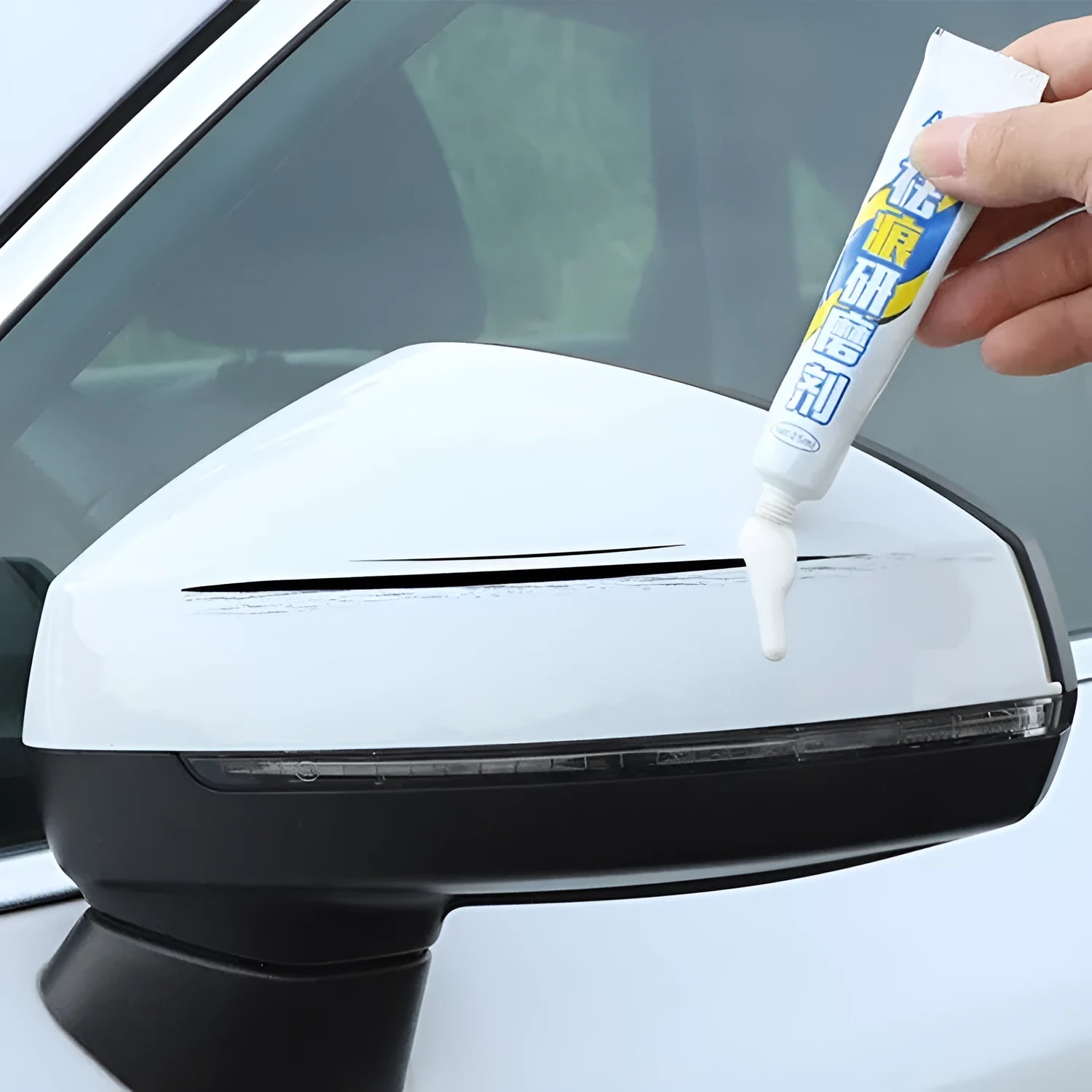 Automotive paint repair pen kit with scratch wax, paint pen, sponge, and sandpaper for car scratches