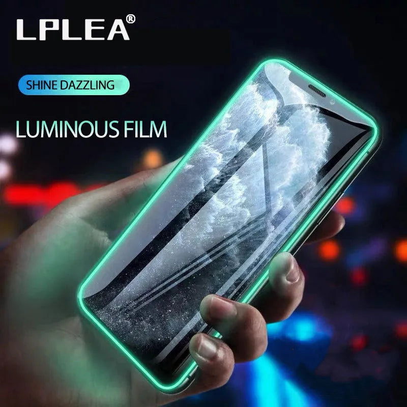 Luminous full cover tempered glass screen protector glowing green in the dark for iPhone.