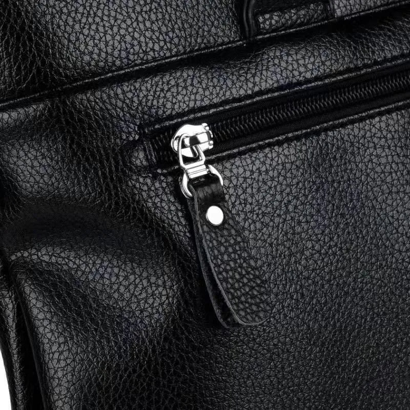 Black PU leather men's messenger bag with crossbody strap and splicing detail.