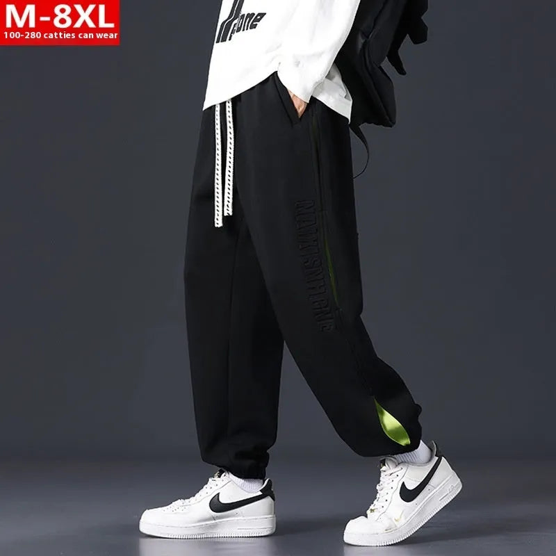 Men's loose cotton trousers with ankle banding and skinny leg design in black colour