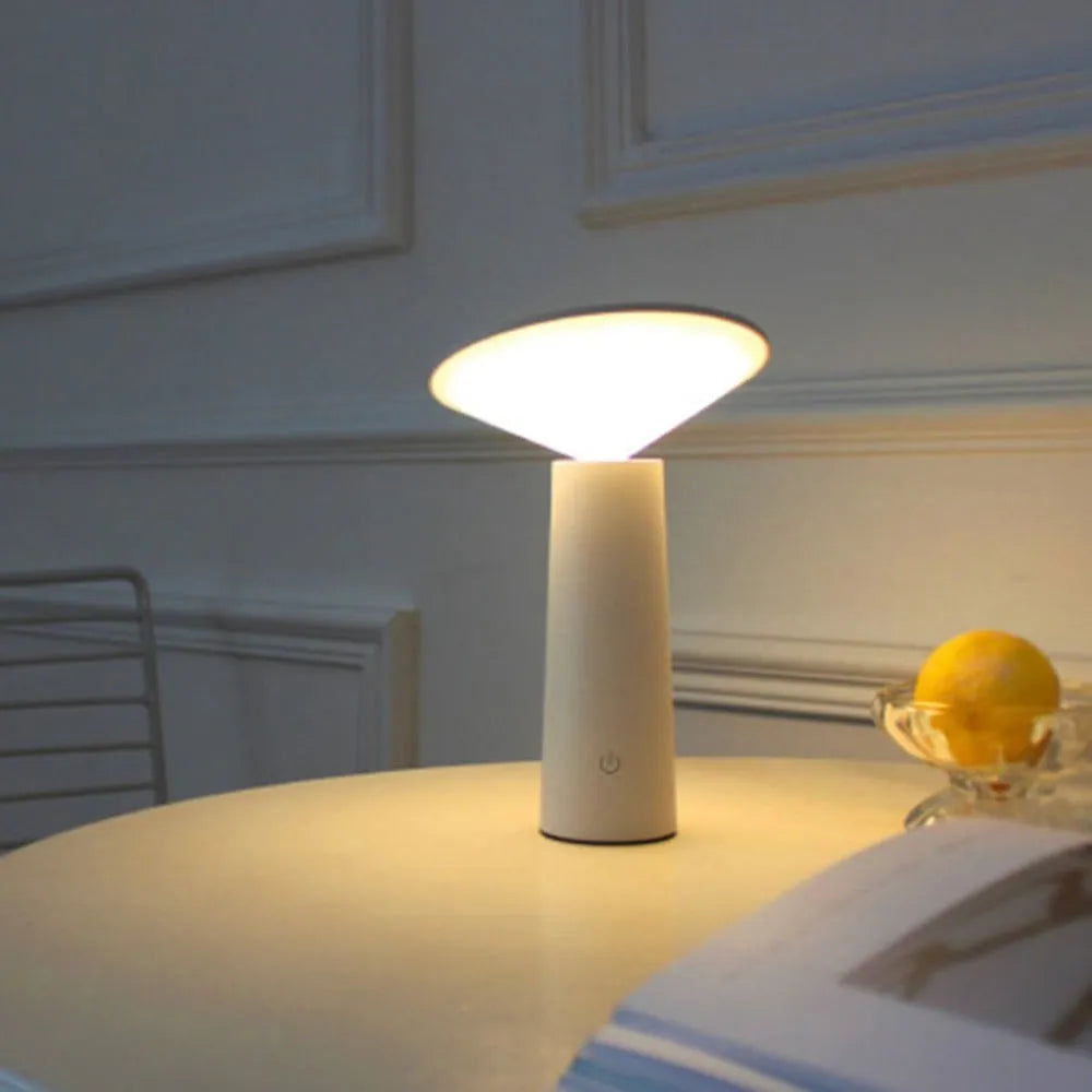 Black USB LED table lamp with adjustable head showing touch controls and micro USB charging port