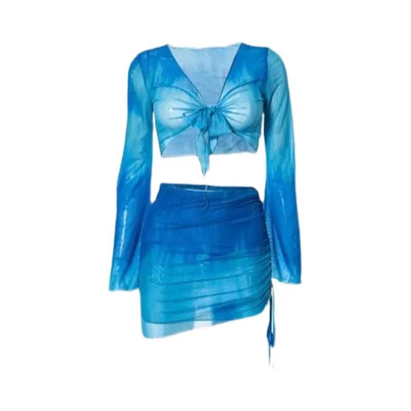 Women's blue four-piece bikini swimsuit set with high-waisted briefs and coordinating skirt