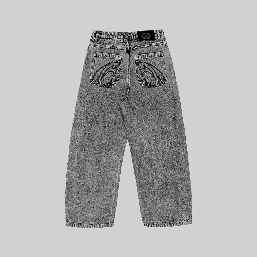 Grey loose straight-leg denim trousers showing mid-waist design and relaxed fit