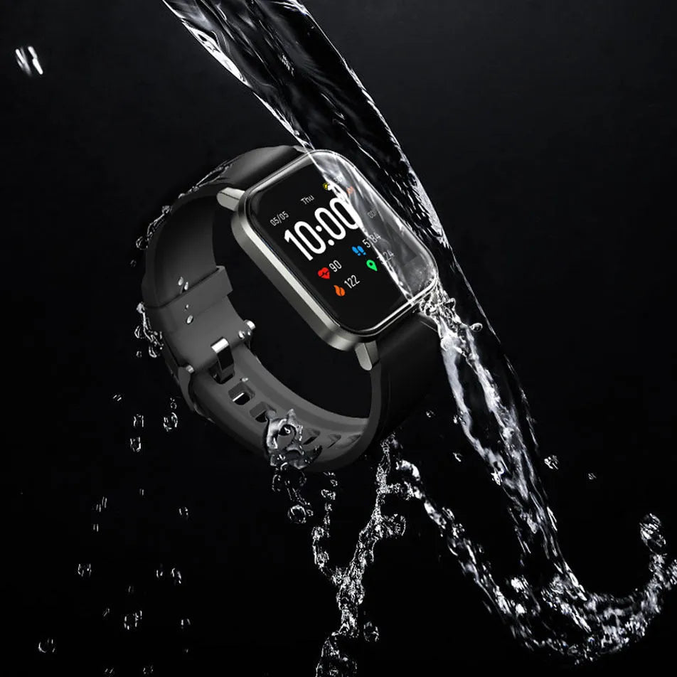 Black waterproof smart bracelet with 1.4-inch colour screen and silicone strap on a wrist