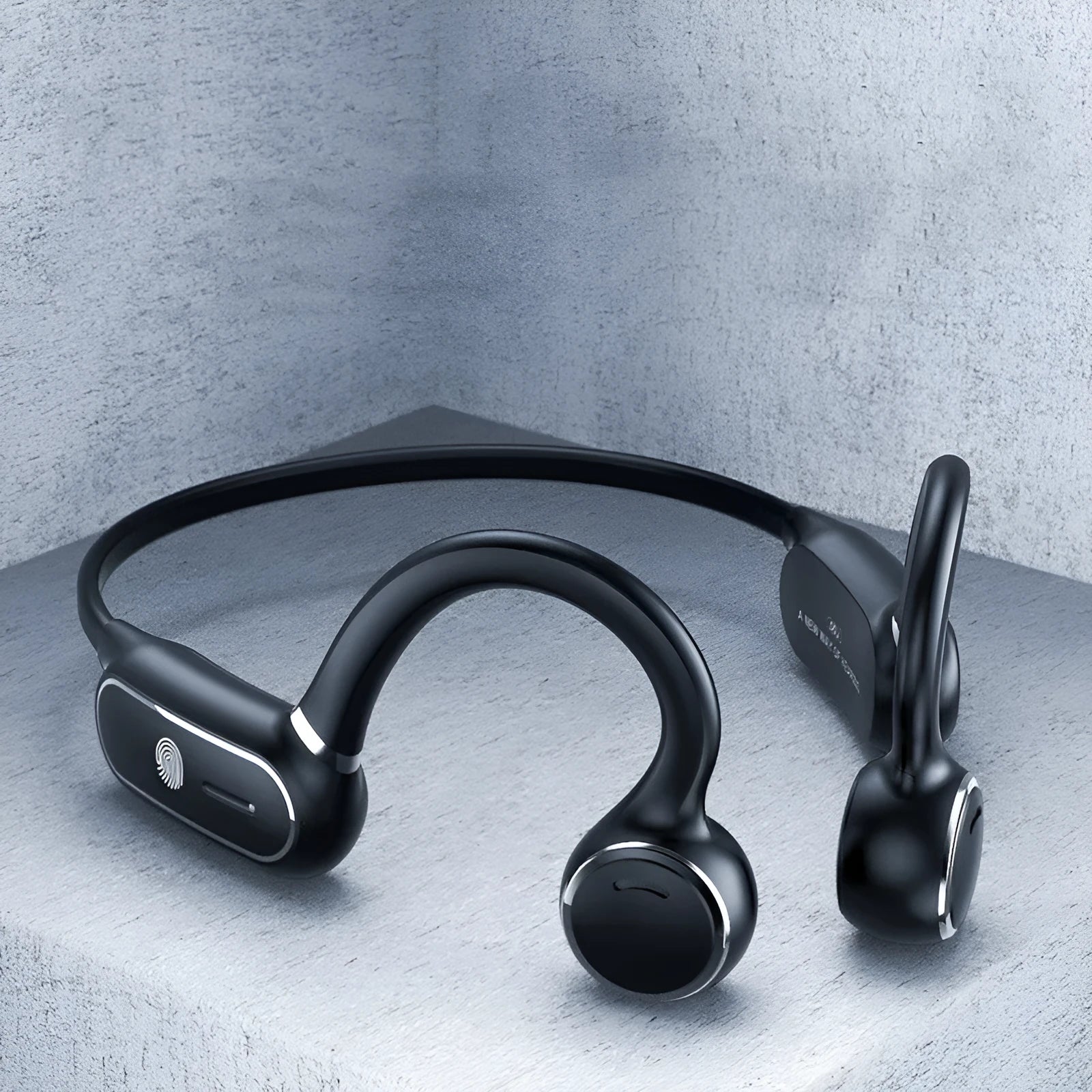 Black open-ear air conduction Bluetooth wireless earphones with a flexible titanium frame on a white background.