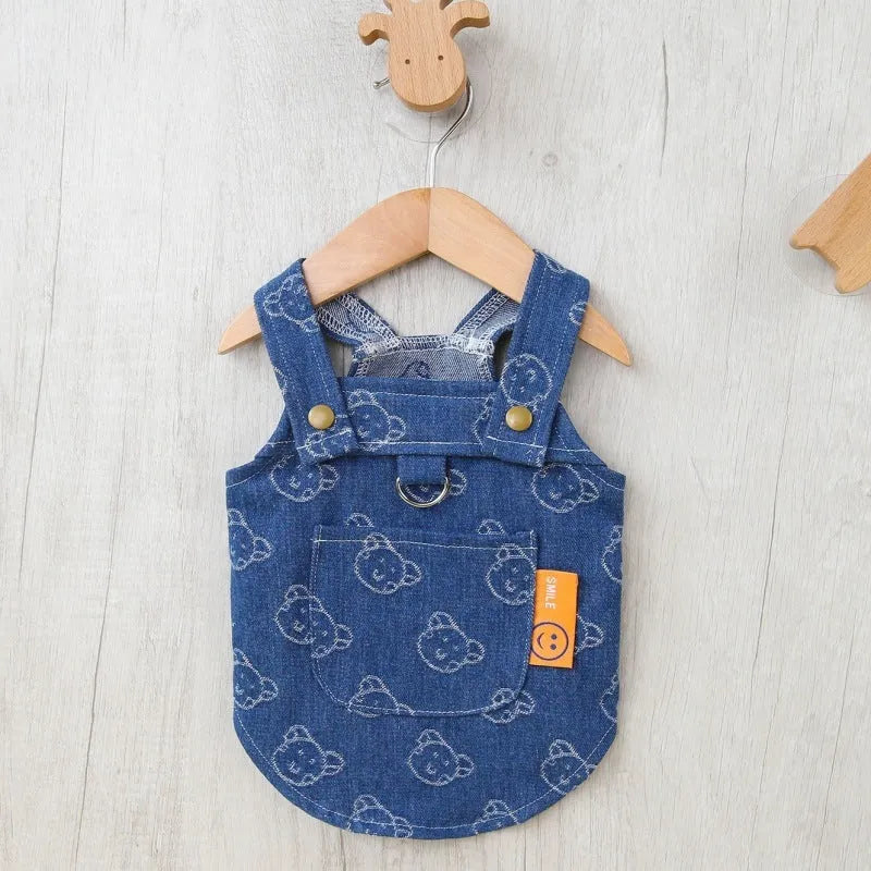 Small dog wearing a light blue denim princess dress with a bracket skirt, suitable for spring or autumn.
