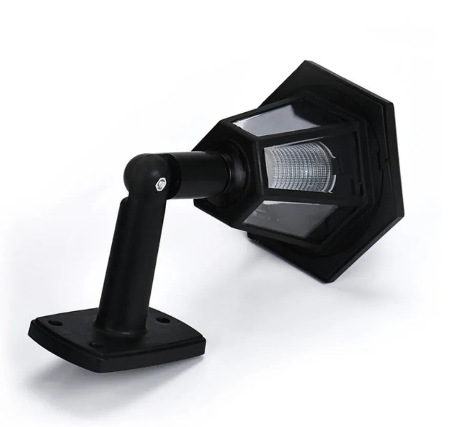 Black hexagonal solar wall light for outdoor use with automatic sensor and IP44 waterproof rating.