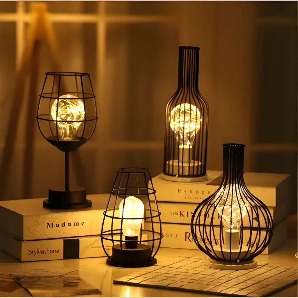 Minimalist hollow iron table lamp with warm white LED light in red wine bottle style