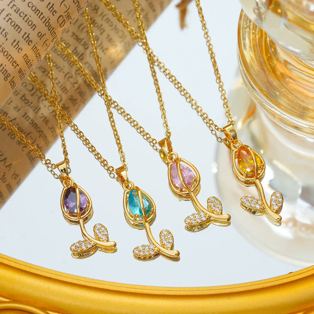 Gold electroplated tulip flower necklace with zircon stones on titanium steel chain