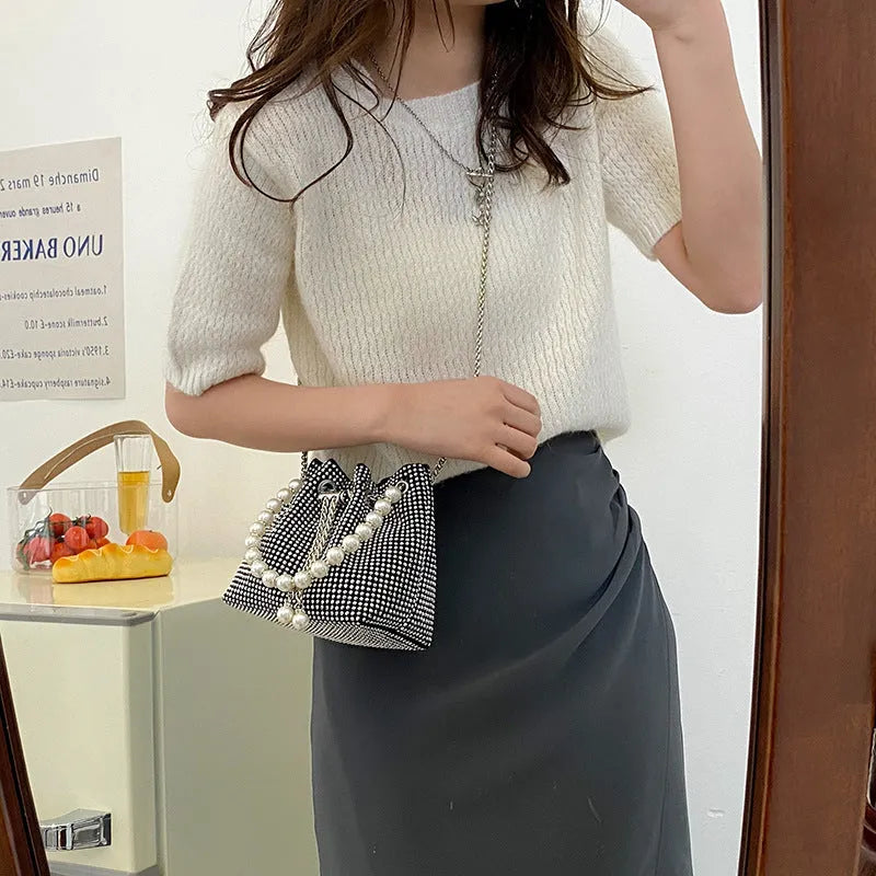 Diamond shoulder strap crossbody bucket bag in soft PU with chain detail and internal organisers