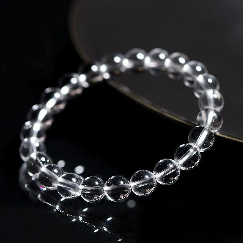 Natural Donghai Old Materials white crystal bracelet with round beads in geometric style.