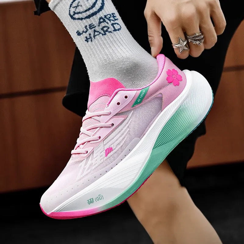 Low-top carbon plate sports sneakers in multiple colours on a natural rubber sole with lace-up front.