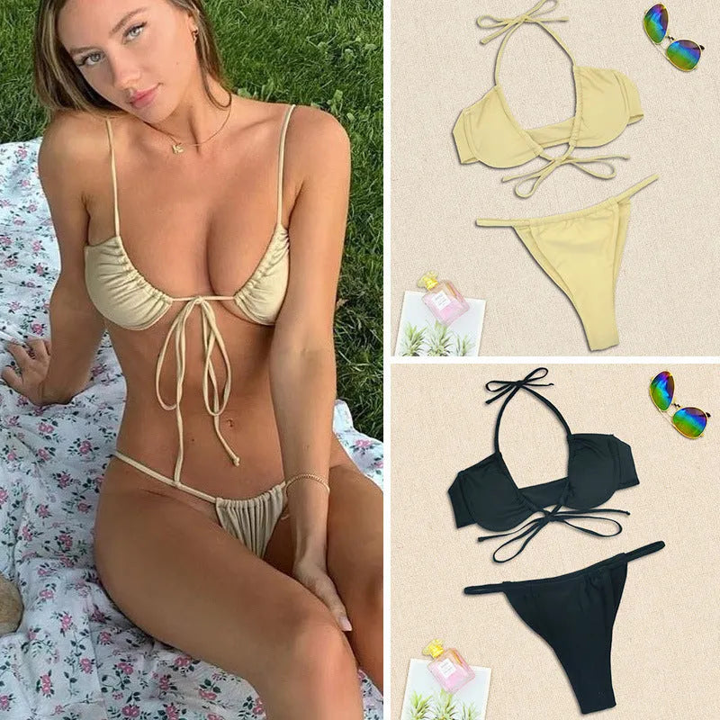 Women's black and mint green two-piece nylon bikini set showing front view.