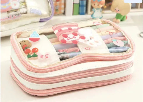 Japanese transparent heart pen bag with rabbit design showing pens inside