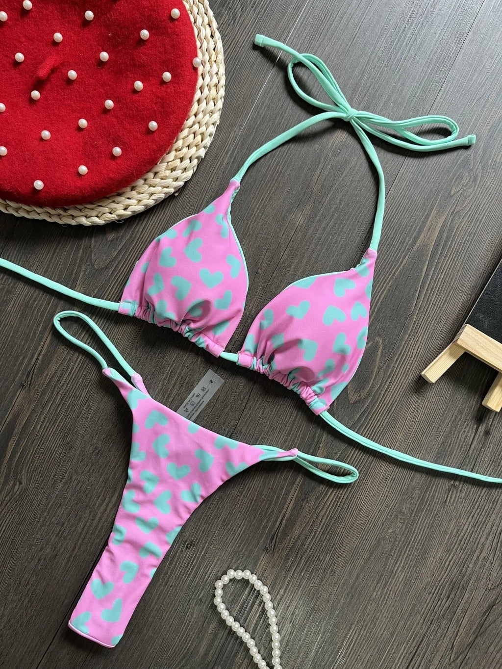 Heart print swimsuit set with backless design and split leg styling in nylon fabric