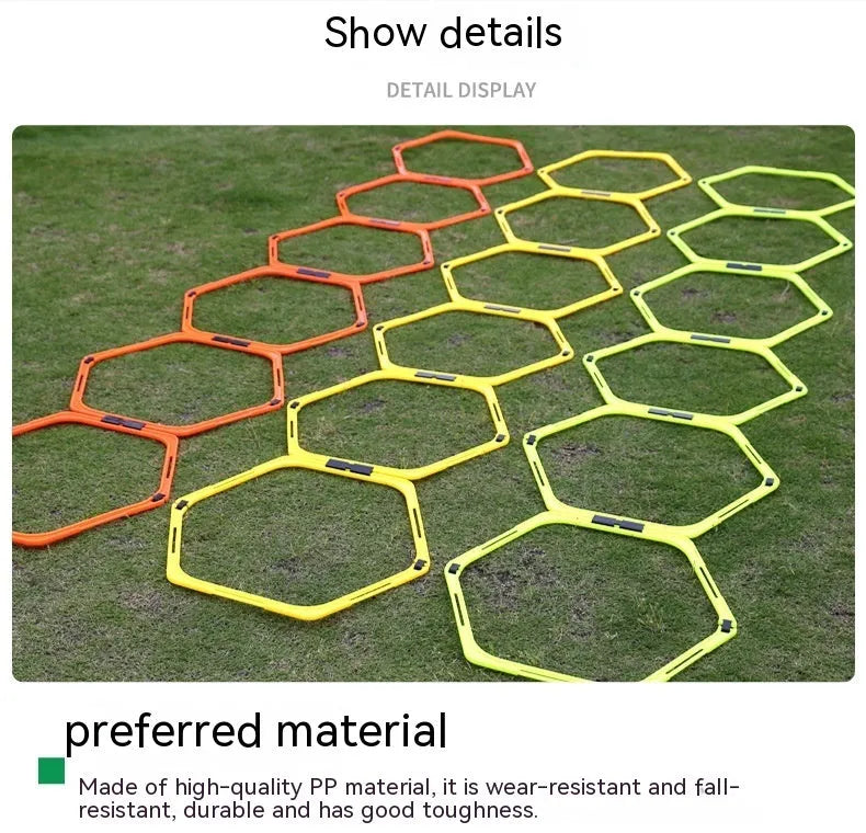 Set of six bright green, orange, and yellow foldable hexagon football agility training rings laid out on grass.
