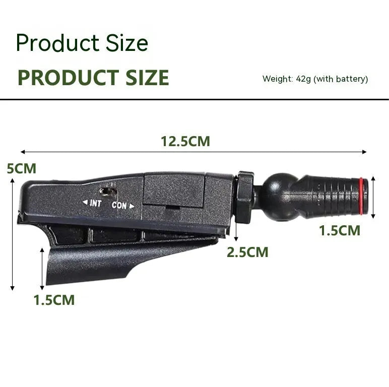 Golf putter laser aiming instrument attached to putter shaft showing projected alignment line on green