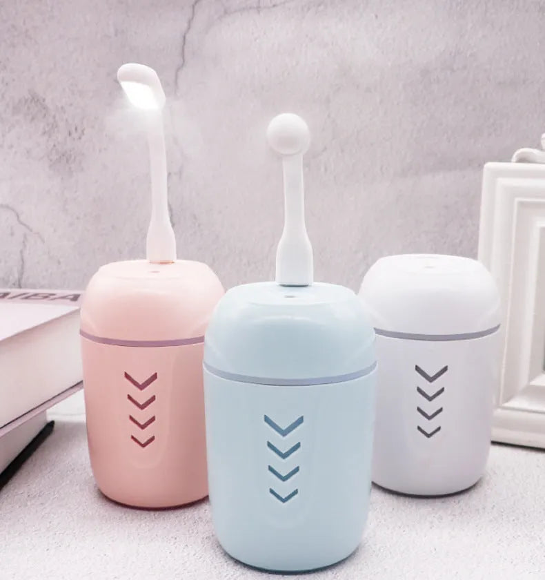 X3 portable car humidifier with columnar design in blue colour showing USB port and mist outlet