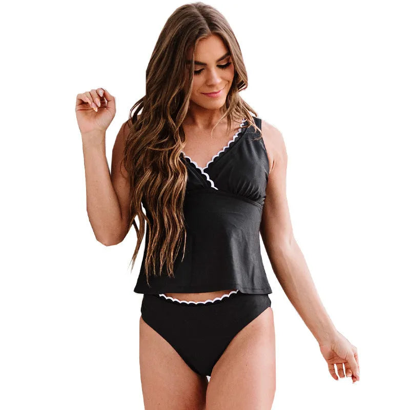 Black women's nylon bikini swimsuit showing sleeveless design and solid colour