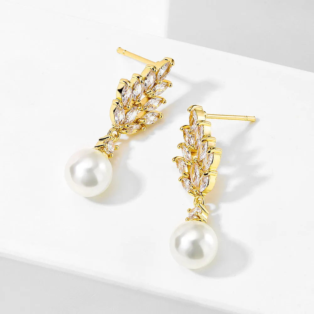 Geometric pearl earrings with micro inlaid zircon detailing and floral design in metallic plating