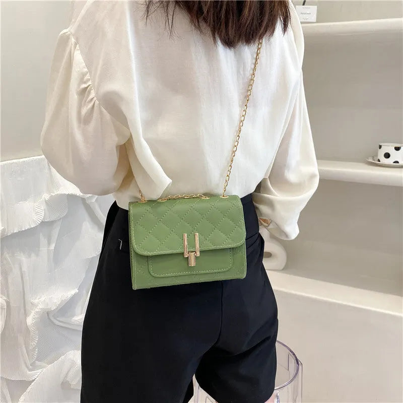 Women's PU leather crossbody bag with diamond lattice pattern in black, white, or green