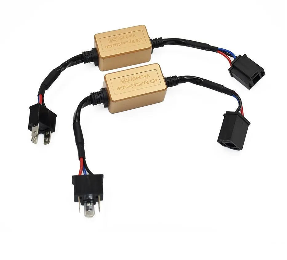Black alloy automotive Canbus decoder for LED headlight bulbs on a white background.