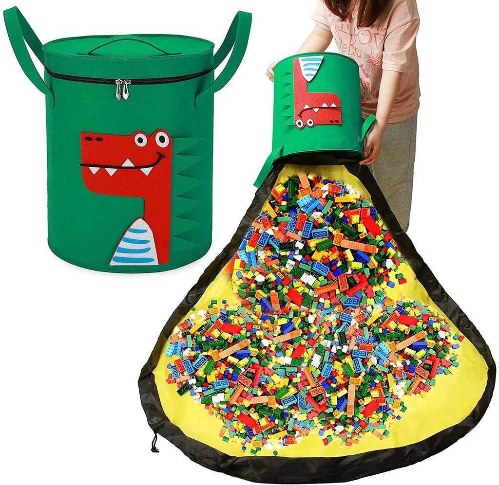 Green felt cube storage bag with a pull rope, shown unfolded as a flat play mat for toys.