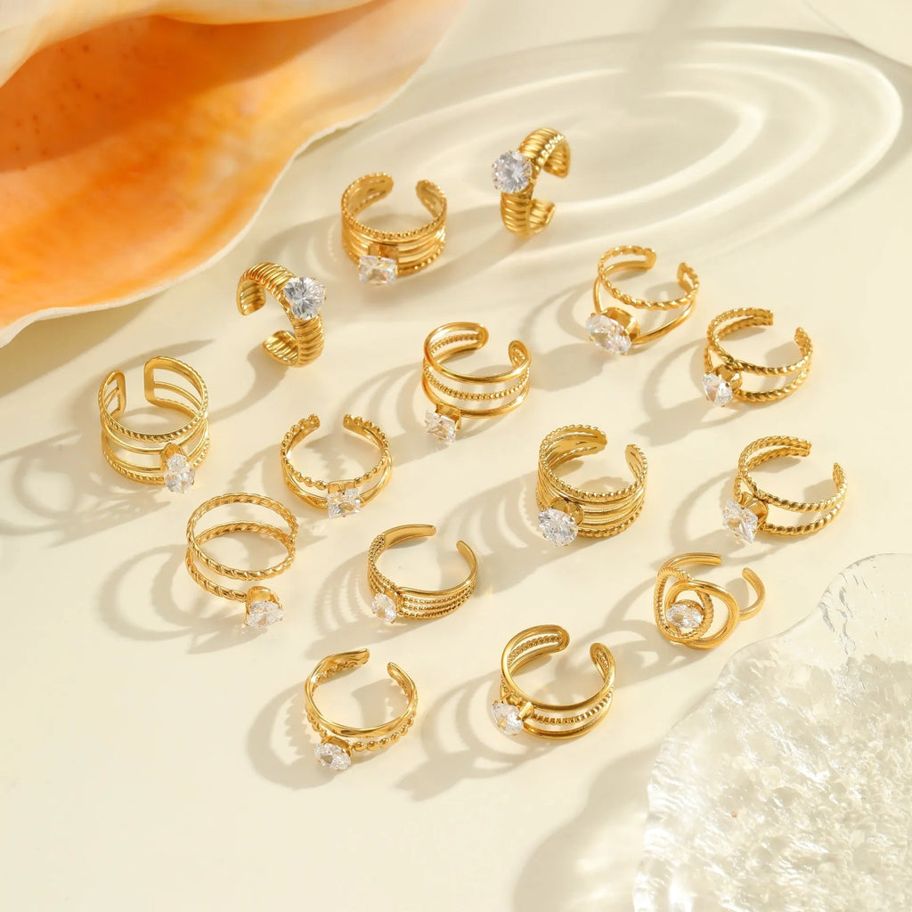 Gold electroplated stainless steel ring with zircon detailing and open mouth adjustable design