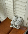 Lightweight breathable casual shoes in beige, black, and pink colours.