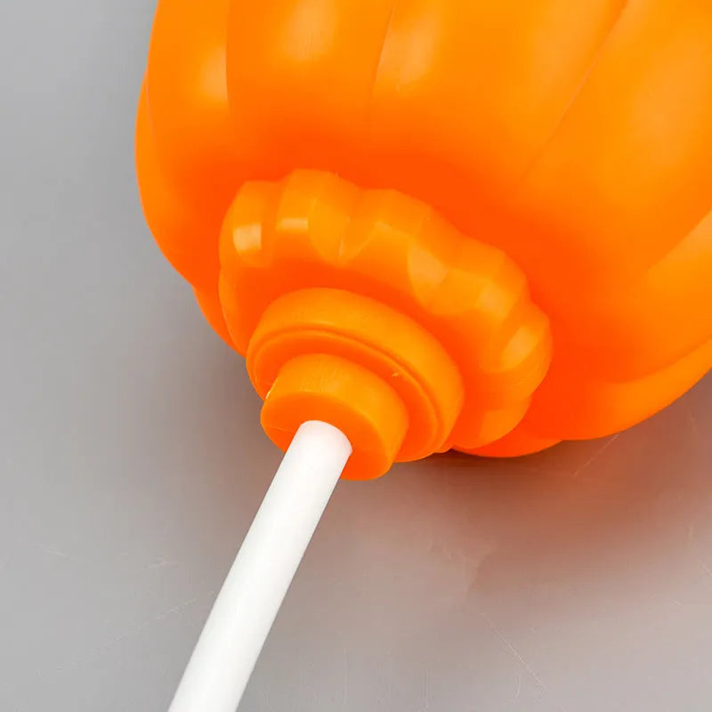 Pumpkin-shaped decorative lamp with USB cable for purple or yellow ambient lighting