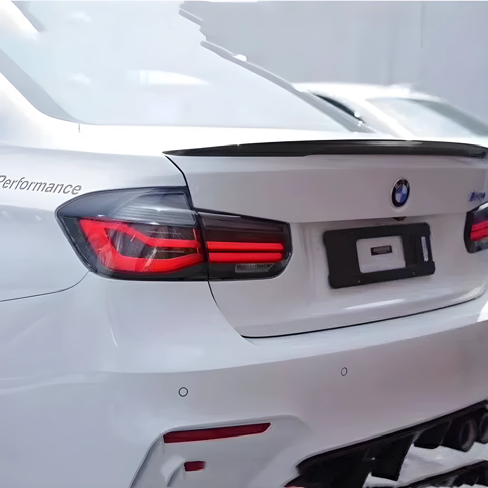 BMW 3 Series modified tail light assembly with streamer steering LED running lights in red or smoked black