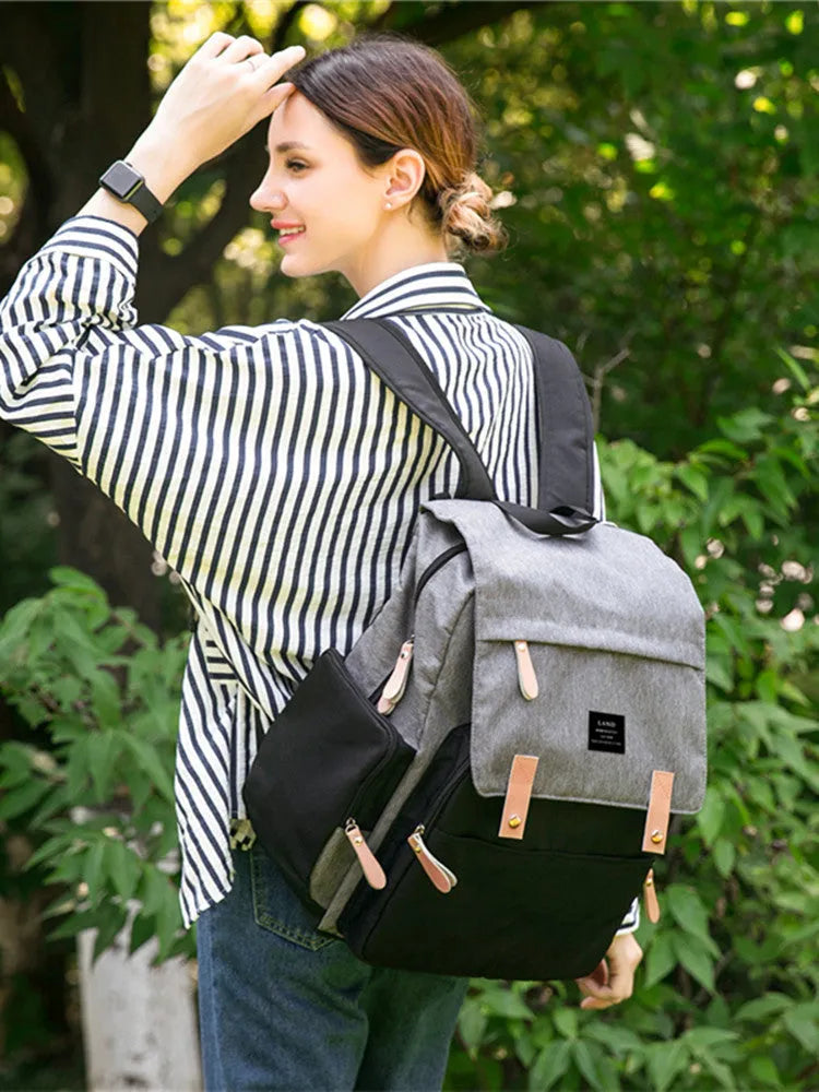 Land Mommy large grey oxford cloth diaper backpack with a changing mat