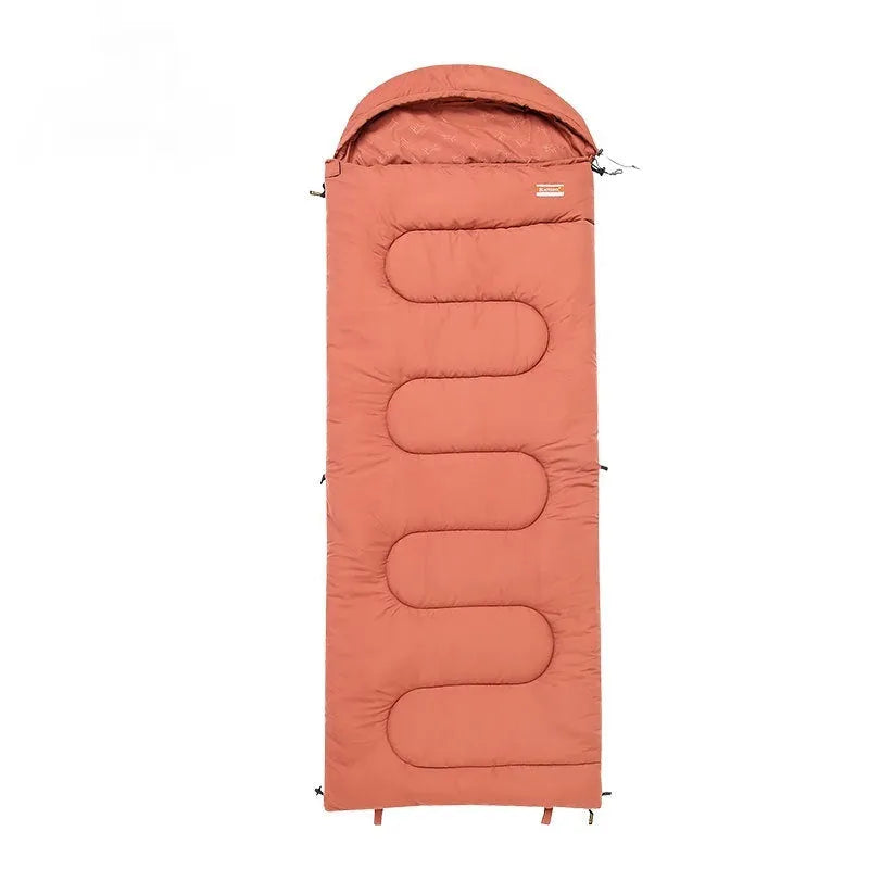 Cotton camping sleeping bag quilt in ochre or olive green colours showing lightweight portable design