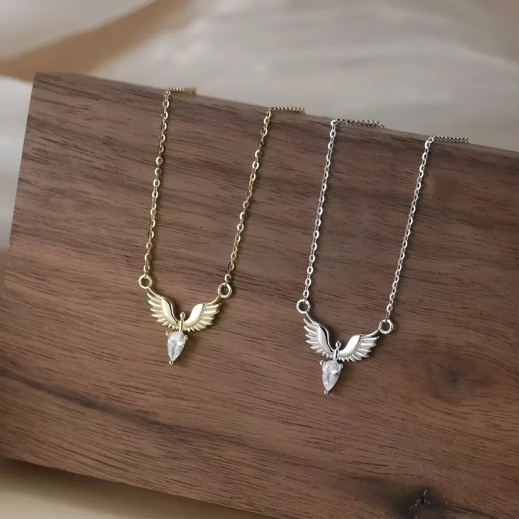 Women's silver eagle pendant necklace with adjustable O-ring chain in white gold or yellow gold colour