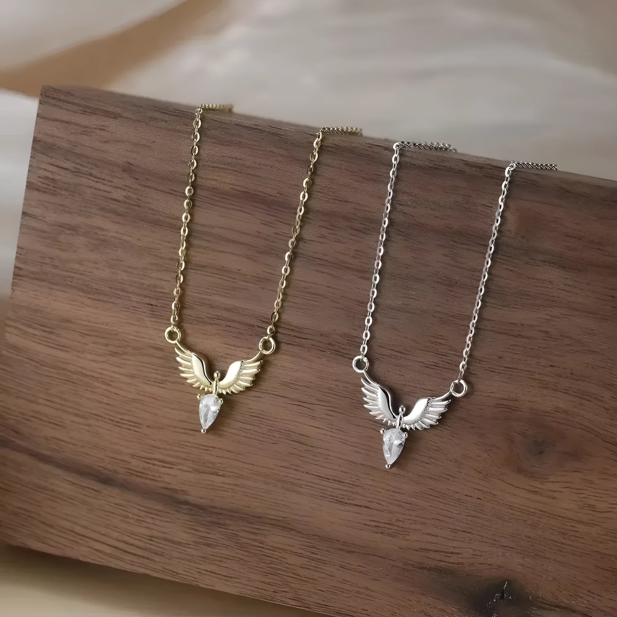 Women's silver eagle pendant necklace with adjustable O-ring chain in white gold or yellow gold colour