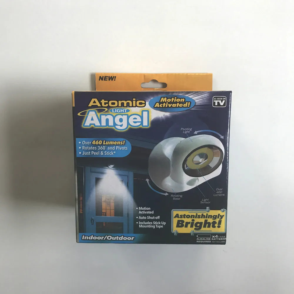White Atomic Angel induction light with ABS plastic housing measuring 13.3 by 9.8 by 15.8 centimetres