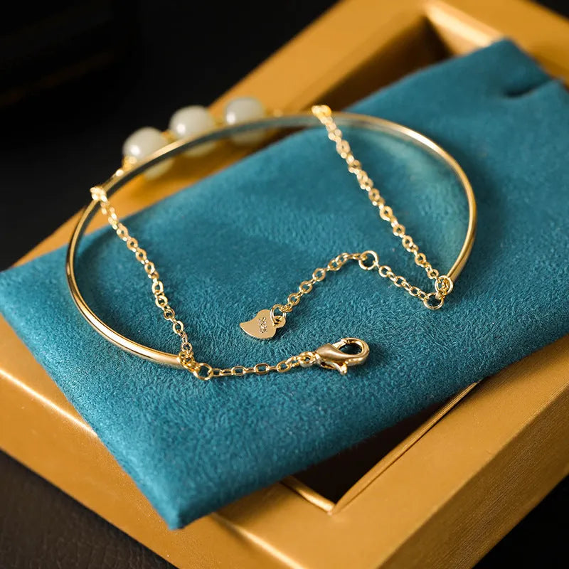 Hetian jade lucky beads bracelet with gold inlay detailing in women's single, double or three-bead versions