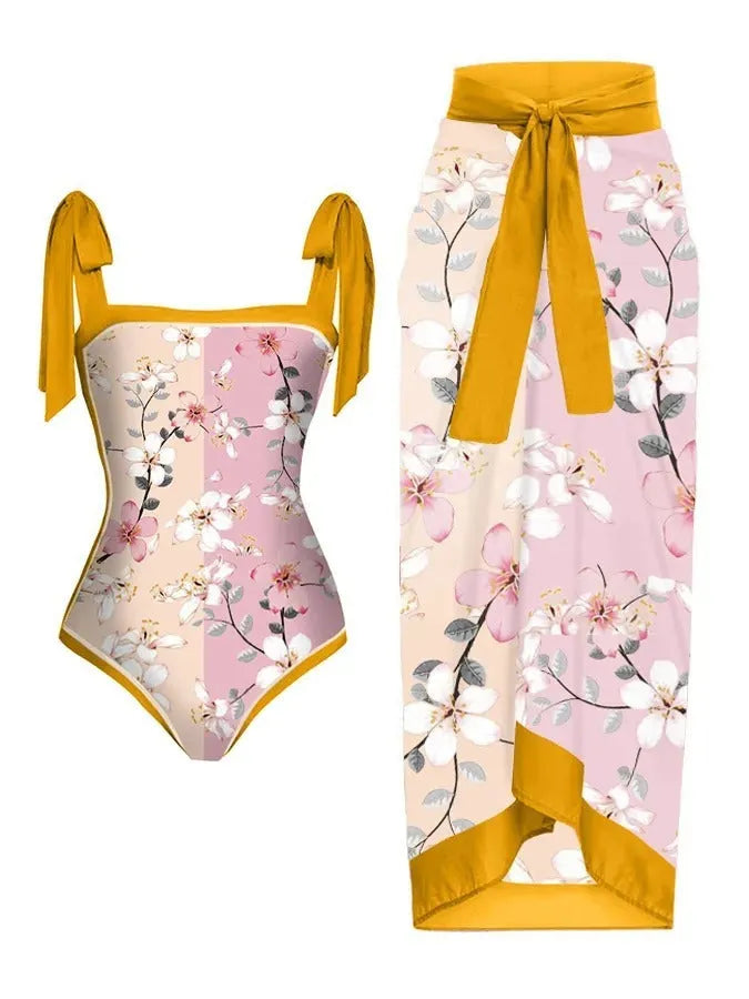 Women's printed two-piece chiffon swimsuit with hip skirt in floral pattern for swimming.